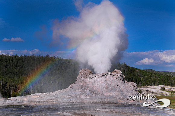 castle geyser rainbow eruption.